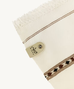 Close-up texture of off-white pashmina shawl for men — soft fabric detail