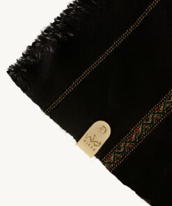 Close-up texture of black pashmina shawl for men — soft fabric detail